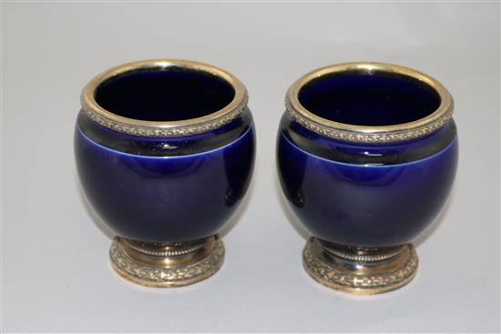 A pair of French silver mounted blue glazed porcelain vases, by Risler & Carre of Paris, 4.25in.